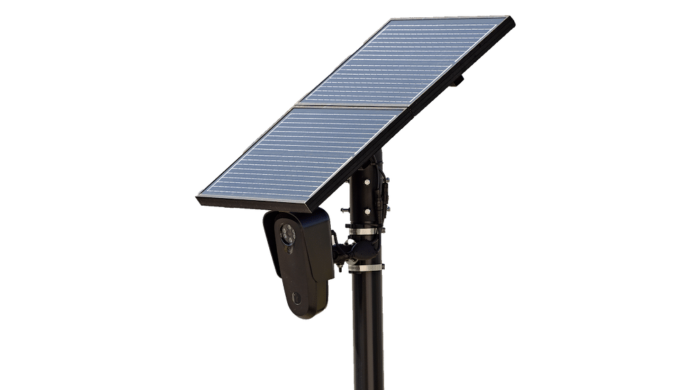 Flock Safety surveillance camera on a solar-panel pole.